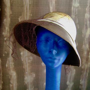 2 Hats together with Flower and Veil