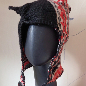 Points (ears) and a Chin Strap